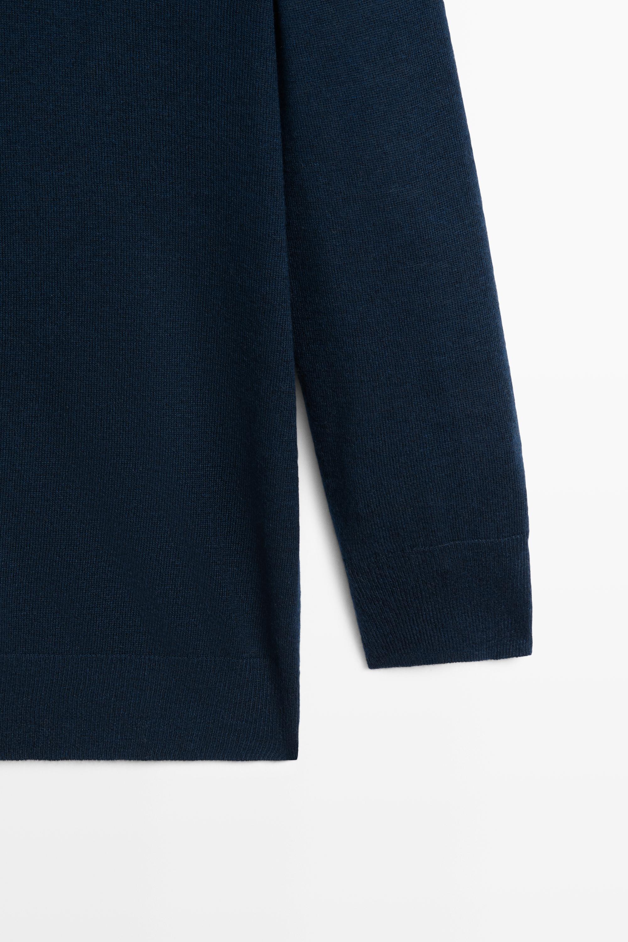 Pull en maille col roulé laine